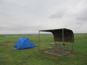 A blue tent and covered table on the Badlands