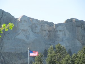 The dead presidents faces peek out of Mount Rushmore